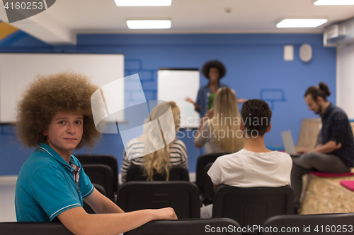 Image of Portrait of young informal businessman