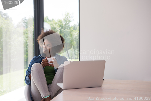 Image of African American woman in the living room