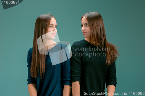 Image of Portrait of two beautiful twin young women