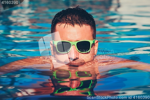 Image of Sunny day in the pool