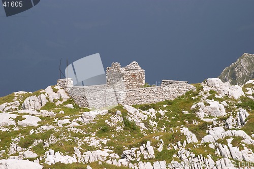 Image of Old miners stony house during a storm, Val di Scalve, Italy