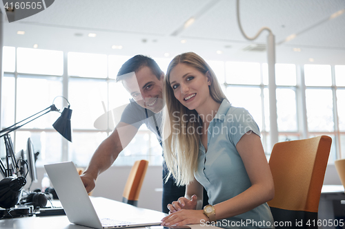 Image of Group of young people employee workers with computer