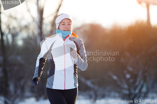 Image of Photo of jogging young athlete