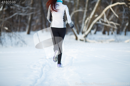 Image of Young girl on morning jog