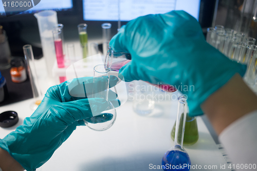 Image of Chemical laboratory with lab assistant