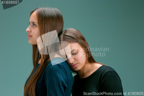 Image of Portrait of two beautiful twin young women