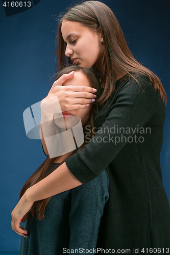 Image of Portrait of two beautiful twin young women