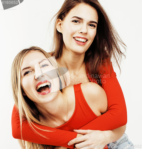 Image of best friends teenage girls together having fun, posing emotional on white background, besties happy smiling, lifestyle people concept 