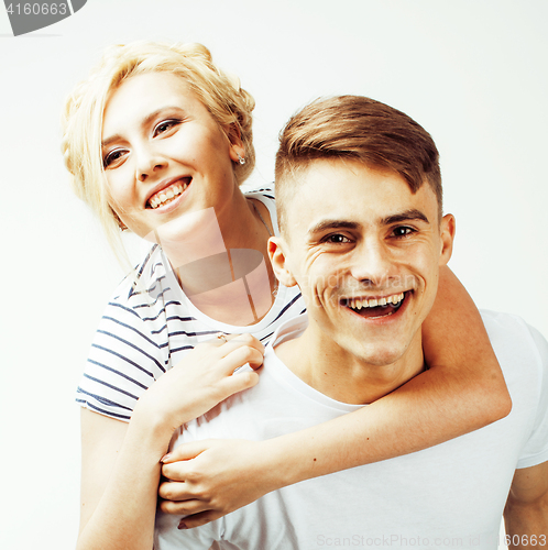 Image of young pretty teenage couple, hipster guy with his girlfriend happy smiling and hugging isolated on white background, lifestyle people concept 