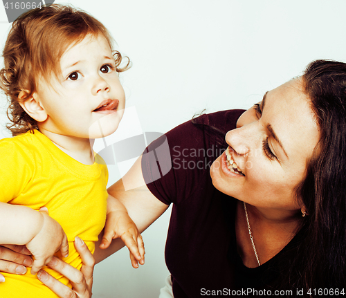 Image of pretty real fashion mother with cute blond little daughter close up isolated on white background, lifestyle people concept