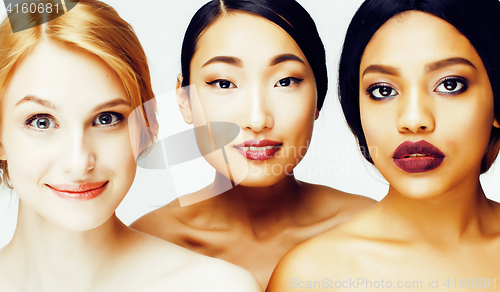 Image of three different nation woman: asian, african-american, caucasian together isolated on white background happy smiling, diverse type on skin, lifestyle people concept 