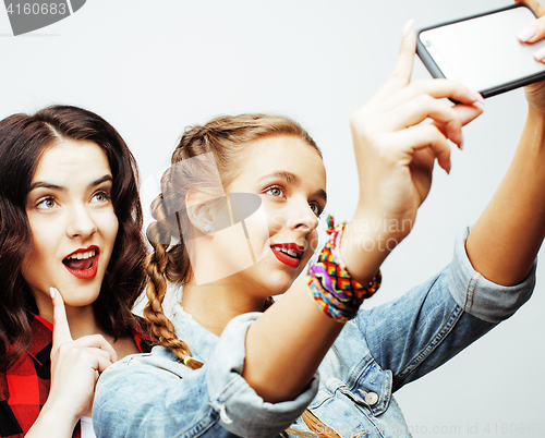 Image of best friends teenage girls together having fun, posing emotional on white background, besties happy smiling, lifestyle people concept 