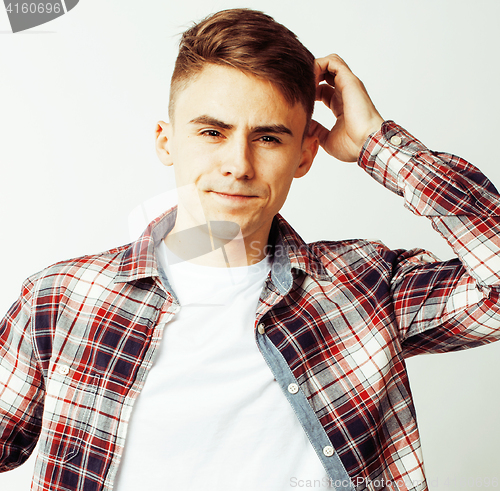 Image of young handsome teenage hipster guy posing emotional, happy smiling against white background isolated, lifestyle people concept 