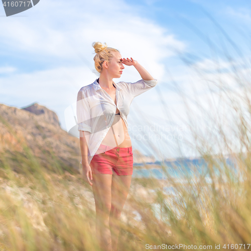 Image of Free Happy Woman Enjoying Sun on Vacations.