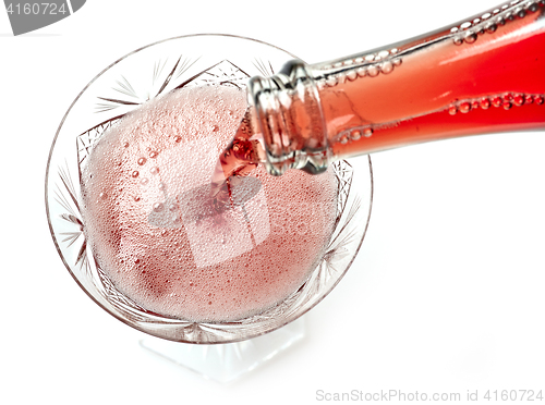 Image of glass of red champagne