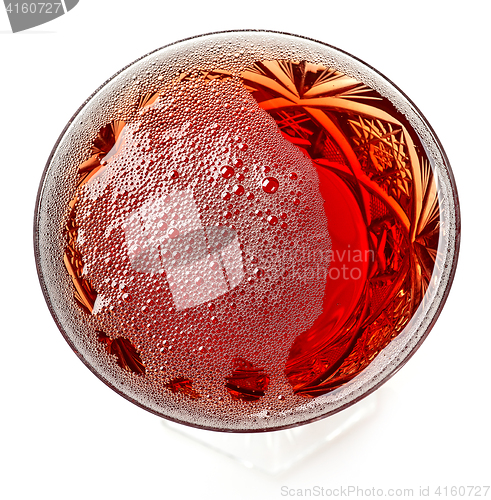 Image of glass of red champagne