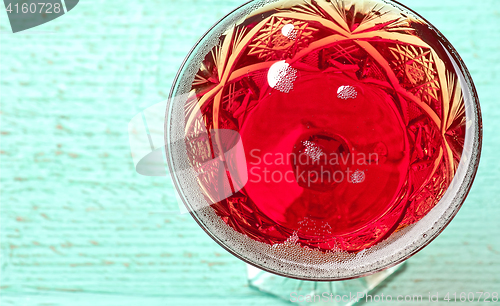 Image of glass of red champagne