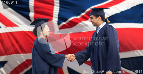 Image of happy students or bachelors greeting each other