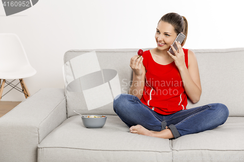 Image of Happy woman at home