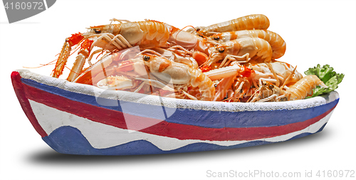 Image of Shrimps in a bowl in the form of a ship at a market in Barcelona