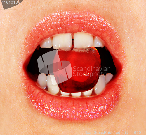 Image of lollipop in mouth