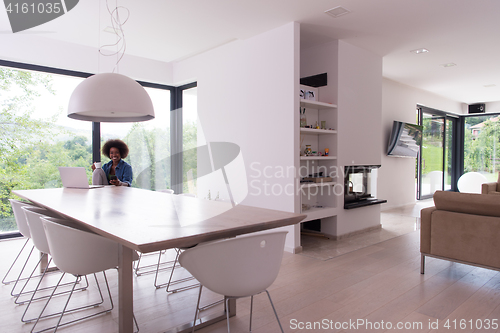 Image of African American woman in the living room