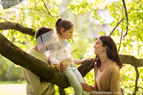 Image of happy family in summer park having fun