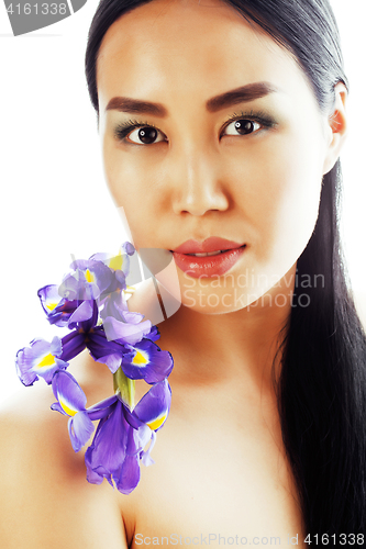 Image of young pretty asian woman with flower orchid close up isolated sp