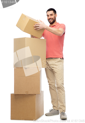 Image of happy man with cardboard boxes