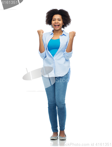 Image of happy african american young woman over white