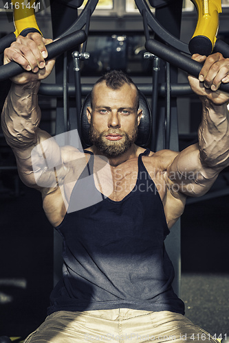 Image of handsome bearded bodybuilding man