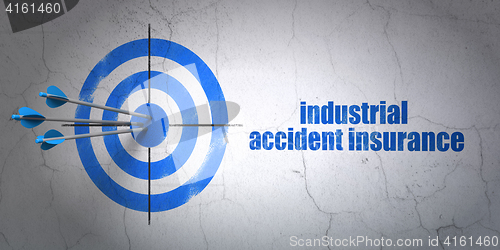 Image of Insurance concept: target and Industrial Accident Insurance on wall background