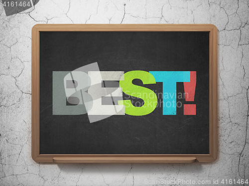 Image of Business concept: Best! on School board background