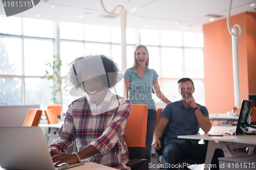 Image of African American informal business woman working in the office