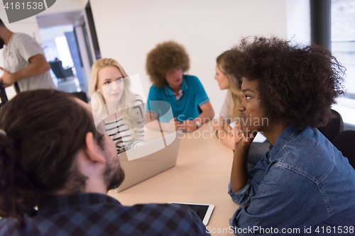 Image of Multiethnic startup business team on meeting