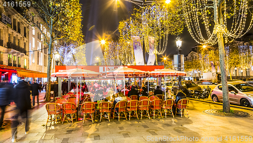 Image of Street Terrace on Champs Elysees in a Winter Night