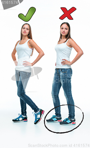 Image of conceptual portrait of two beautiful twin young women