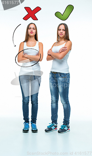 Image of conceptual portrait of two beautiful twin young women