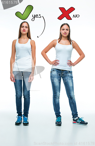 Image of conceptual portrait of two beautiful twin young women