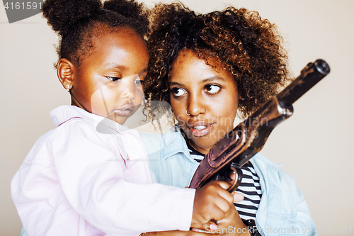 Image of adorable sweet young afro-american mother with cute little daugh