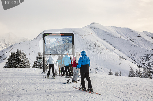 Image of Skiers at the Top of the Slope