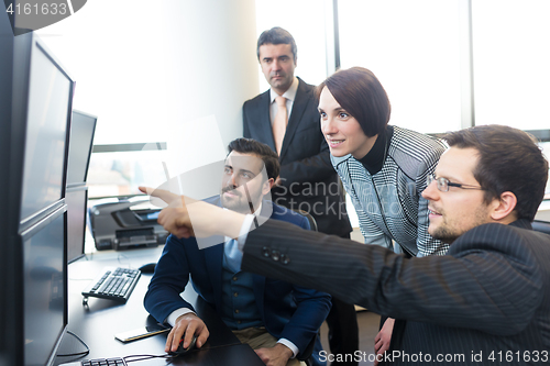 Image of Business team working in corporate office.