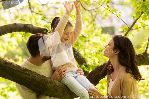 Image of happy family in summer park having fun