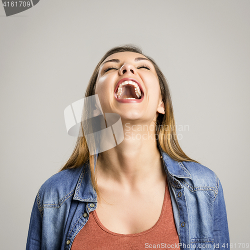 Image of Happy woman laughing