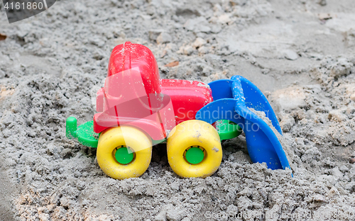 Image of Children\'s machine in the sand