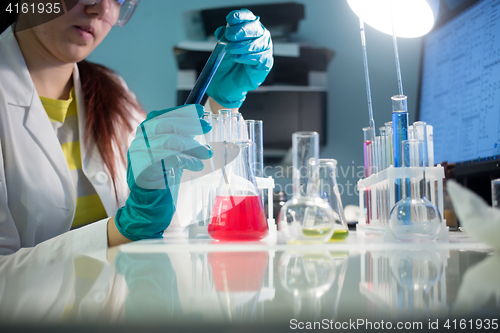 Image of Girl with laboratory test tubes