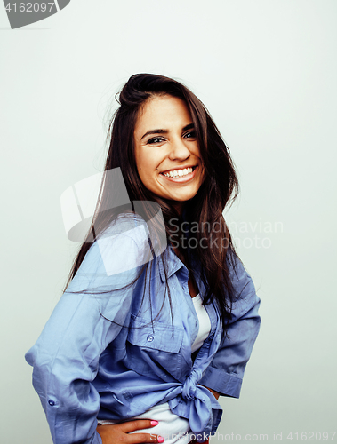 Image of young happy smiling latin american teenage girl emotional posing on white background, lifestyle people concept 