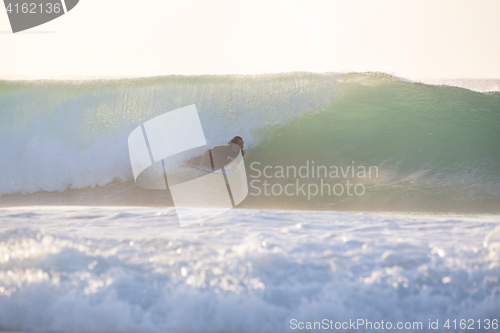 Image of Body surfer riding a perfect wave.