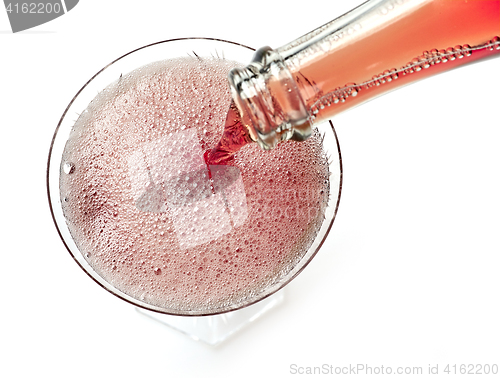 Image of glass of red champagne