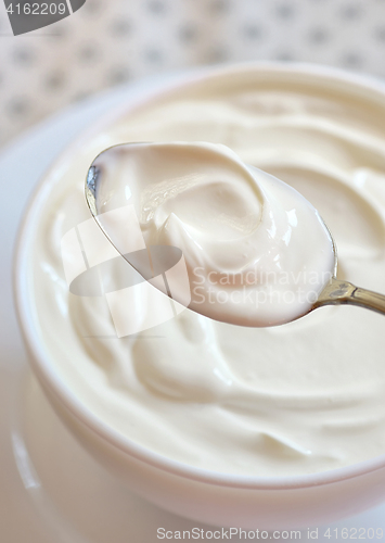 Image of Ceramic bowl of white yogurt